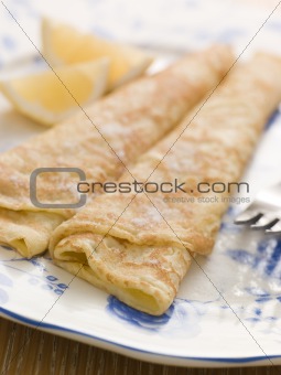 Plate of Folded Pancakes Lemon and Sugar