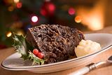 Portion of Christmas Pudding with Brandy Butter