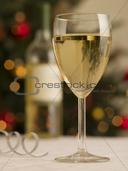 Glass and Bottle of White Wine