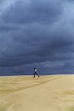 Man running across sand flats