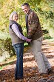 Senior couple on woodland walk
