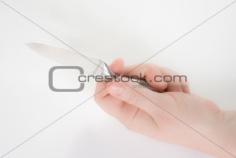 Hand holding a knife