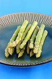 Fresh asparagus shoots on a plate