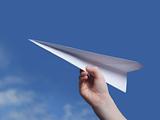 throwing a paper plane.. 