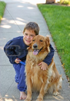 Boy Hugging Dog