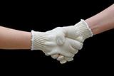 Labor handshake with safety gloves isolated on black