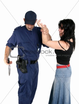 Officer disarms a weapon from a suspected criminal