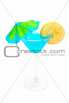 Blue cocktail with lemon and umbrella