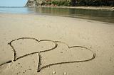 Two hearts on a beach