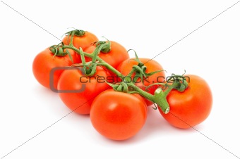 Seven red tomatoes