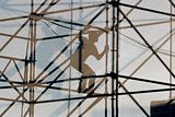 silhouette of worker at constriction frame