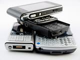 Stack Pile of Several Modern Mobile Phones PDA Cell Handheld Uni