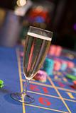 Close up of champagne glass on roulette table