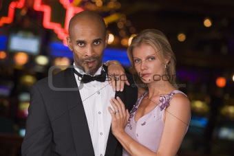 Couple standing inside casino