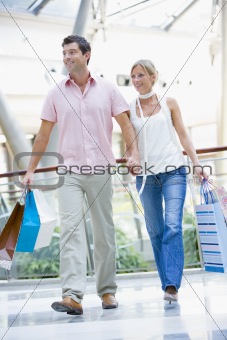 Couple shopping in mall