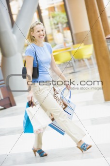 Young woman shopping in mall