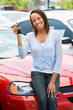 Woman picking up new car