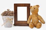 Wooden frame, Teddy bear and flower pot
