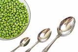 Peas in a bowl with spoons