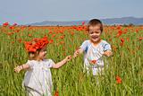 Kids on poppy field