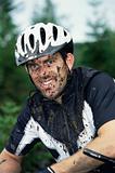 Mountain biker covered in mud