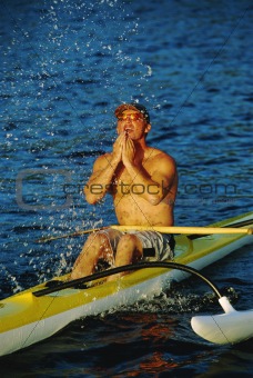 A man canoeing