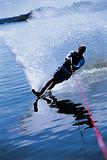 A young man water skiing