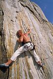 A man climbing a rock face