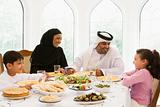 A Middle Eastern family enjoying a meal 