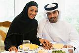 A Middle Eastern couple enjoying a meal 