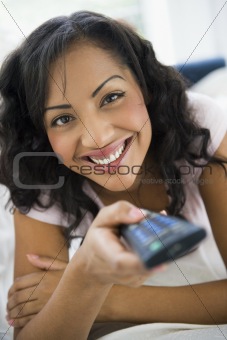 A South American woman watching television