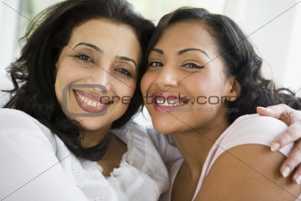 A Middle Eastern woman with her daughter-in-law