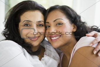 A Middle Eastern woman with her daughter-in-law