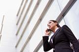 Businesswoman talking on cell phone 