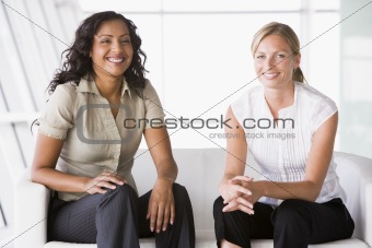 Businesswomen sitting in lobby