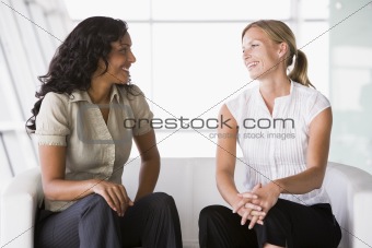 Businesswomen talking in lobby