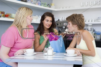 Young women having tea in a cafe