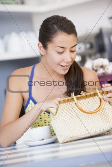 A young woman sitting in a cafe