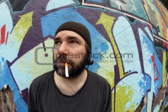 Smoking homeless man