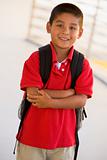 Portrait of kindergarten boy with backpack