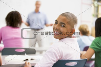 A schoolboy in a high school class