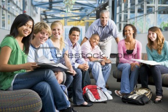 School children and their teacher in a high school class
