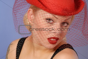 gorgeous blond girl in fifties pinup hat