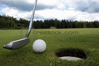 Putter and ball
