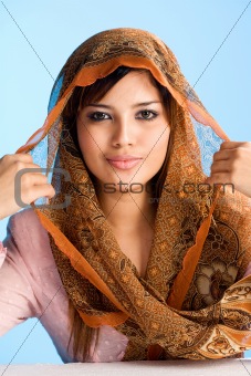 Muslim young woman in head scarf