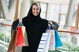 A Middle Eastern woman in a shopping mall