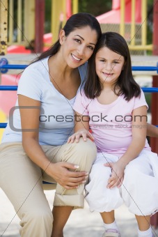 Mother and daughter in playground