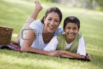 Mother and son having picnic