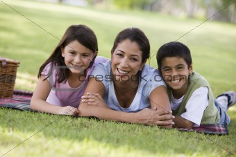 Mother and children having picnic