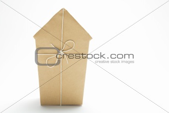 House Wrapped In Brown Paper